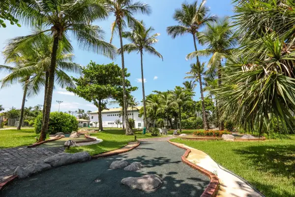 Jardins com palmeiras do Casa Grande Hotel Resort & Spa, no Guarujá